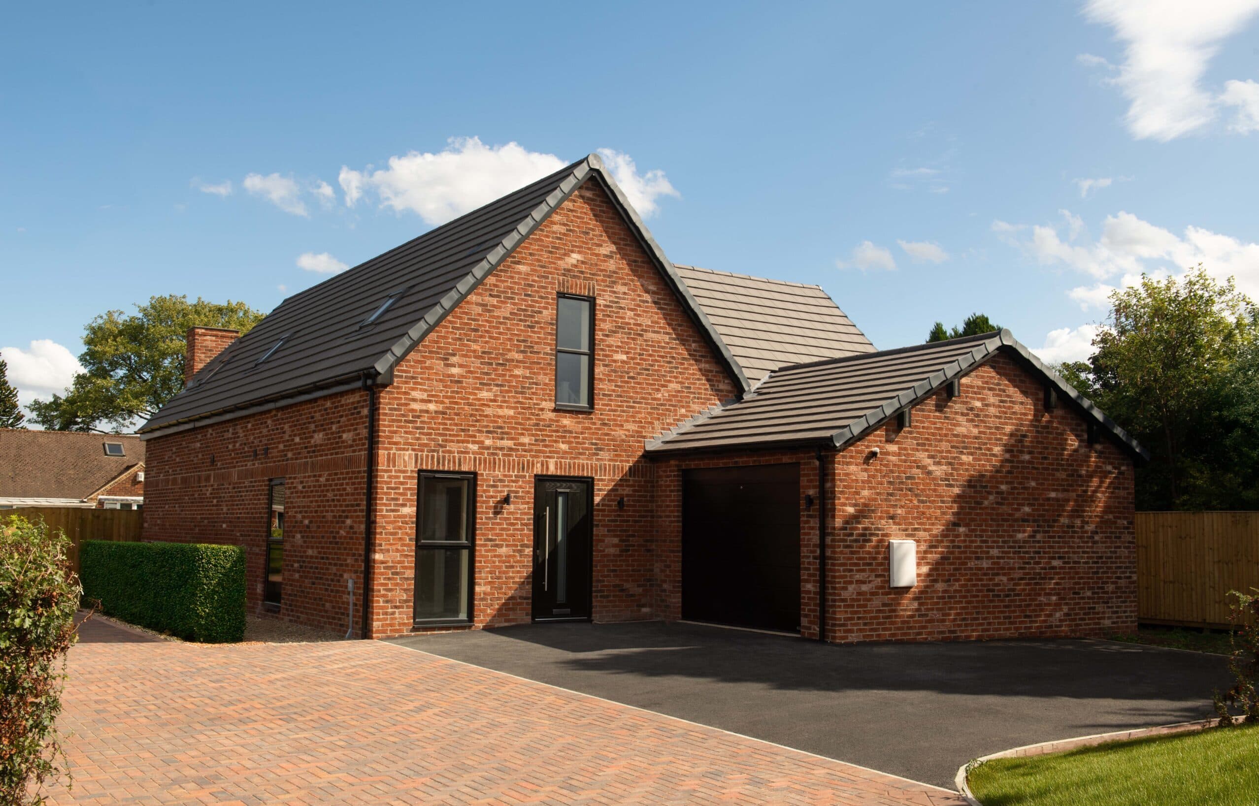 Lowther, a finished red-brick detached house in Garforth